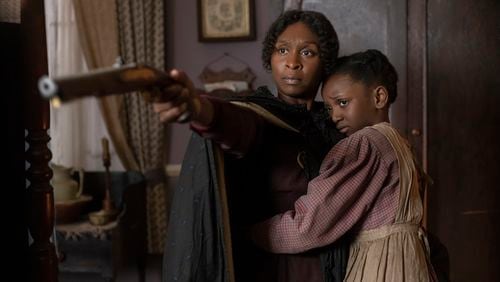 Cynthia Erivo, left, with Aria Brooks, stars as Harriet Tubman in “Harriet.” Glen Wilson/Focus Features