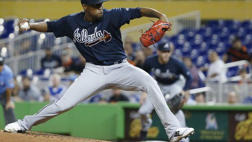 Braves’ Julio Teheran delivers a pitch against the Miami Marlins Thursday. (AP Photo/Wilfredo Lee)