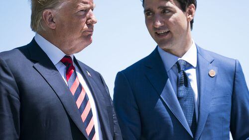 FILE— Canadian Prime Minister Justin Trudeau talks with President Donald Trump during a welcome ceremony at the G-7 summit meeting at the Fairmont Le Manoir Richelieu in La Malbaie, Quebec, June 8, 2018. Trump has gone behind Canada’s back and negotiated what he calls a trade deal with Mexico, leaving Canada on the sidelines. He has also threatened to impose hefty tariffs on cars, one of Canada’s most important exports. (Doug Mills/The New York Times)