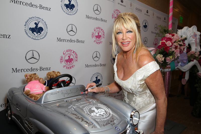BEVERLY HILLS, CA - OCTOBER 11: Actress Suzanne Somers autographs a Mercedes-Benz car for auction at the Carousel of Hope Ball benefitting Barbara Davis Center for Diabetes on October 11, 2014 in Beverly Hills, California. (Photo by Chelsea Lauren/Getty Images for Mercedes-Benz) BEVERLY HILLS, CA - OCTOBER 11: Actress Suzanne Somers autographs a Mercedes-Benz car for auction at the Carousel of Hope Ball benefitting Barbara Davis Center for Diabetes on October 11, 2014 in Beverly Hills, California. (Photo by Chelsea Lauren/Getty Images for Mercedes-Benz)