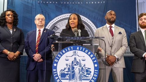 Fulton County District Attorney Fani Willis speaks Monday at a press conference at Fulton County Government Center in Atlanta following the indictment against former President Donald Trump and others in an election interference case. (Arvin Temkar / arvin.temkar@ajc.com)