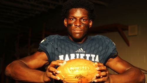 Marietta tight end Arik Gilbert - a 2019 AJC Super 11 selection - set the schools' records for catches, yards and touchdowns.