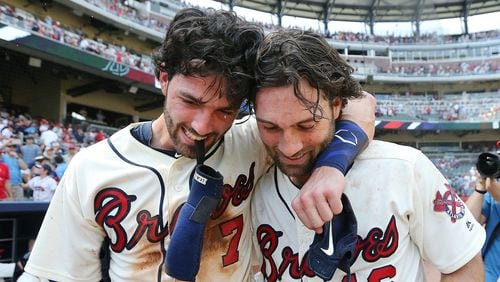 June 3, 2018 Atlanta: Atlanta Braves ninth inning heroes Dansby Swanson (left) and Charlie Culberson celebrate after Culberson hit a walk off home run to beat the Washington Nationals 4-2 during a MLB baseball game on Sunday, June 3, 2018, in Atlanta.  Curtis Compton/ccompton@ajc.com