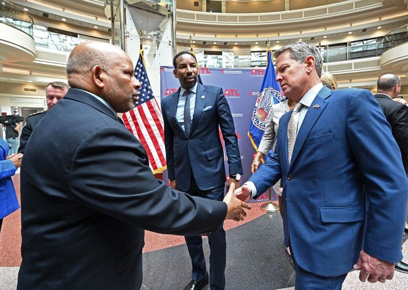 Atlanta Mayor Andre Dickens, center, praised Gov. Brian Kemp, right, for his “wise” decision to release a memo ahead of the vote on Buckhead cityhood legislation, saying it helped lawmakers “see that it will have implications across the whole state — and the governor nor I want that.” (Hyosub Shin / Hyosub.Shin@ajc.com)