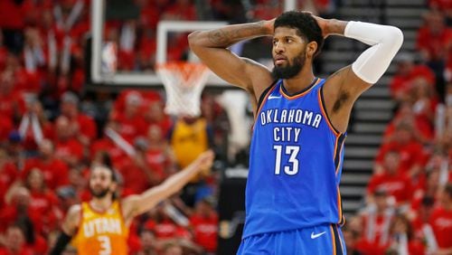 Oklahoma City Thunder forward Paul George (13) holds his head after a teammate fouls a Jazz player in the second half during Game 3 of an NBA basketball first-round playoff series Saturday, April 21, 2018, in Salt Lake City. The Jazz won 115-102.