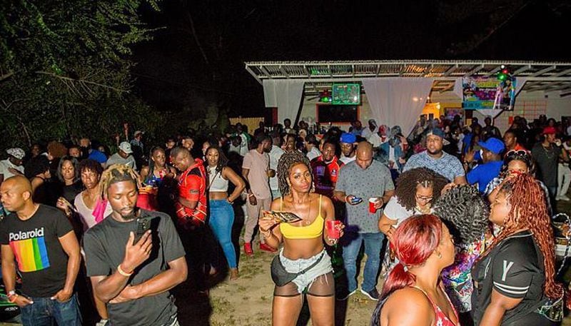 Party goers are captured in the moment at a Nico Simone Compound bash.