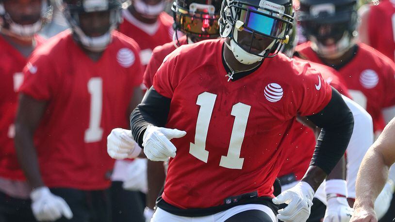 July 27, 2017 Flowery Branch: Falcons wide receiver Julio Jones runs a agility drill the first day of team practice at training camp on Thursday, July 27, 2017, in Flowery Branch. Curtis Compton/ccompton@ajc.com