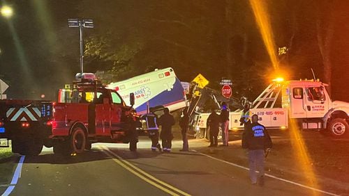 A man died in an ambulance crash Friday night in Fairburn.