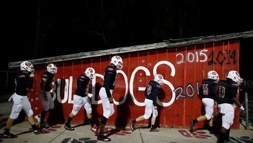 North Gwinnett players make their way onto the field before during a GHSA high school football AAAAAAA second round playoff game on Friday, Nov. 17, 2017, at North Gwinnett High School in Suwanee, Ga. (AJ Reynolds/Special)
