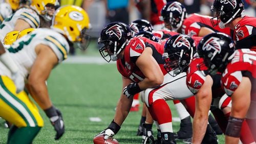 Falcons center  Alex Mack #51 prepares to snap the ball during the second half against the Packers at Mercedes-Benz Stadium on September 17,  in Atlanta