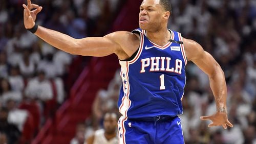 Justin Anderson of the Philadelphia 76ers reacts after hitting a 3-pointer in the third quarter of the game against the Miami Heat at American Airlines Arena on April 19, 2018 in Miami, Florida.