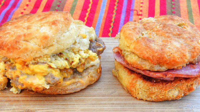 211127 Atlanta, Ga: L-R: Sausage Egg and Cheese Biscuit (gluten free), Ham Biscuit. Photos taken Saturday November 27, 2021 at Bomb Biscuits, 660 Irwin Street, Atlanta, Ga. 30312. For 120321GGdine for restaurant review. (Chris Hunt for The Atlanta Journal-Constitution)