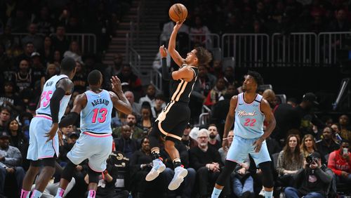 Career night for Trae Young: Hawks All-Star guard Trae Young scored a career-high 50 points as Atlanta defeated Miami 129-124 Thursday in Atlanta. (AP Photo/John Amis)