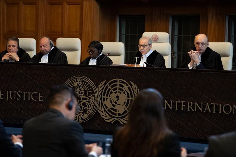 Judge Nawaf Salam, second right, presides over the International Court of Justice in The Hague, Netherlands, Tuesday, April 30, 2024, where Mexico is taking Ecuador to the United Nations' top court accusing the nation of violating international law by storming into the Mexican embassy in Quito and arresting former Ecuador Vice President Jorge Glas, who had been holed up there seeking asylum in Mexico. (AP Photo/Peter Dejong)