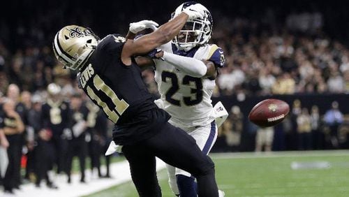 Los Angeles Rams' Nickell Robey-Coleman breaks up a pass intended for New Orleans Saints' Tommylee Lewis during the second half of the NFL football NFC championship game, Sunday, Jan. 20, 2019, in New Orleans.