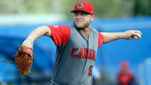 Kevin Chapman, shown here pitching for Canada in the World Baseball Classic, has been claimed off waivers by the Braves.