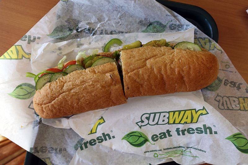 Subway, in a statement released Thursday, said “there simply is no truth” to the allegations posed by the lawsuit. The company, which runs more than 26,740 stores in the U.S., added that its freshly made sandwiches, wraps and salads are prepared with 100% cooked tuna and mayonnaise. (Photo by Joe Raedle/file)