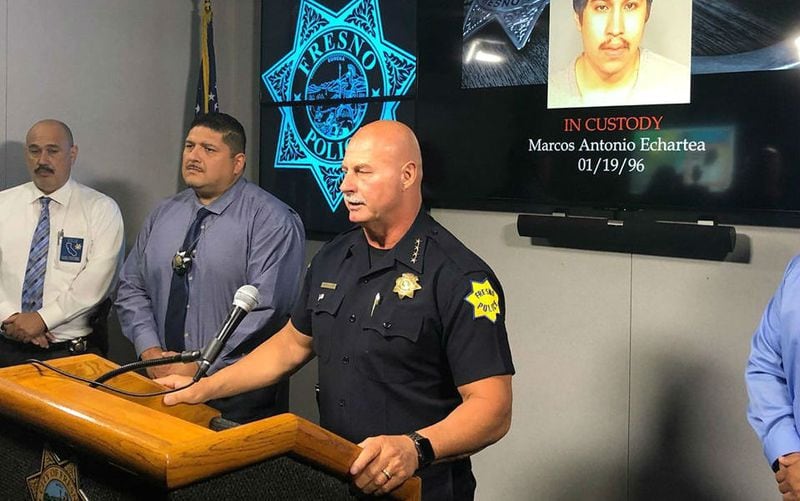 Fresno police Chief Jerry Dyer, at podium, speaks Sunday, June 23, 2019, about the arrest of Marcos Antonio Echartea, 23, who is charged with three counts of attempted murder in the shooting of Fayth Percy, 10 months old. The infant was shot as she and her mother, 18-year-old Deziree Menagh, sat in a car with a friend early Sunday morning on a Fresno, Calif., street.