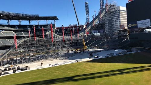 A look at work in progress on building the 15-story-tall steel scaffold jump structure, which will be covered with snow for the Visa Big Air event at SunTrust Park.