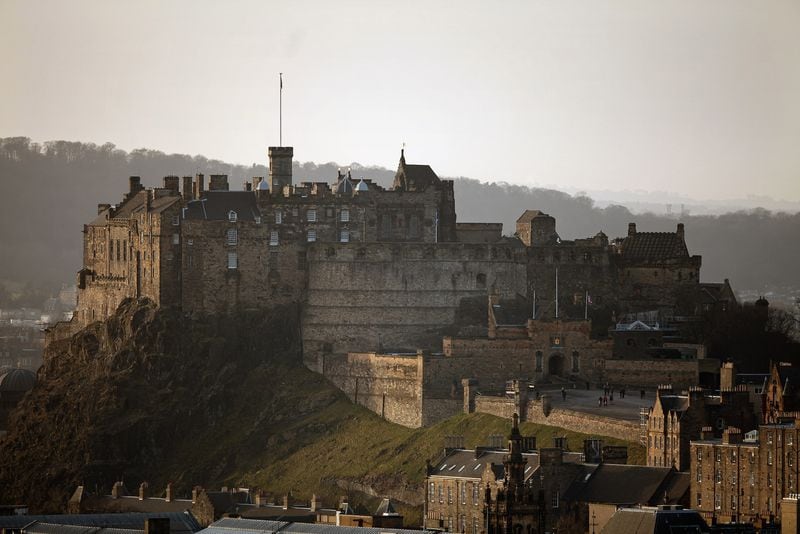 EDINBURGH, SCOTLAND - FEBRUARY 07:  A general view of Edinburgh Castle on February 7, 2012 in Edinburgh, Scotland. The castle dominates the city skyline was built on top of an extinct volcano, and has had a human settlement on the castle site since 900BC.  (Photo by Jeff J Mitchell/Getty Images)