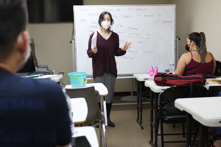 Annie Suen teaches English in an entry level class on Nov. 11, 2021. The  Center for Pan Asian Community Services offers online and in-person classes. (Miguel Martinez for The Atlanta Journal-Constitution)