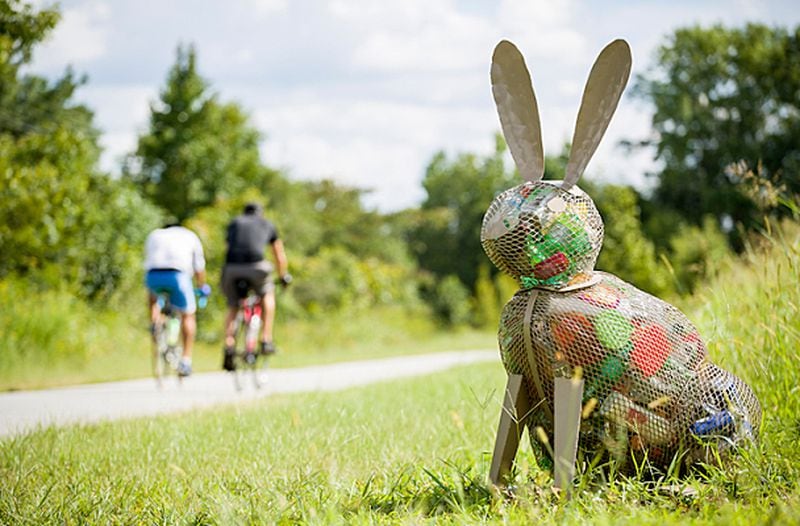 Recyclable rabbit art alongside the Greenville Health System Swamp Rabbit Trail.