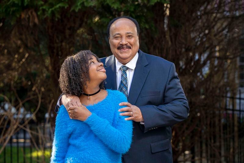 Martin Luther King III and his daughter Yolanda King stand for a portrait at their residence in Atlanta on Jan. 28, 2021. King resisted his wife's request to name their daughter after Coretta Scott King, because of the pressure that would come with the name. (Alyssa Pointer / Alyssa.Pointer@ajc.com)
