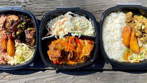 A takeout feast from Spicy Hill includes jerk chicken, fried chicken and curry goat. Wendell Brock for The Atlanta Journal-Constitution