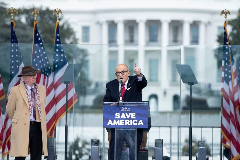 California attorney John Eastman, left, with then-Trump attorney Rudy Giuliani, center, at The Ellipse near the White House on Jan. 6, 2021, in Washington, D.C. (Brendan Smialowski/AFP/Getty Images/TNS)