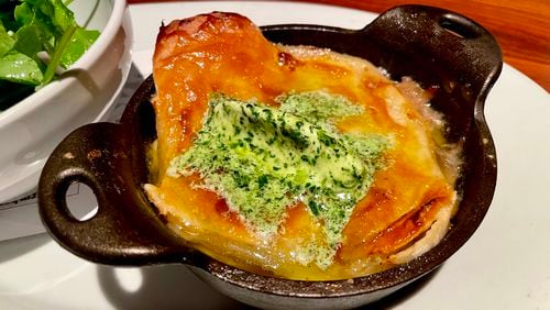 The duck pot pie at Wrecking Bar is delicate but hearty. Angela Hansberger for The Atlanta Journal-Constitution
