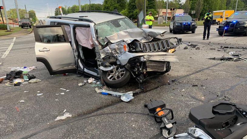 Authorities are investigating after a man ran from Smyrna police and crashed, leaving two of his passengers with serious injuries.