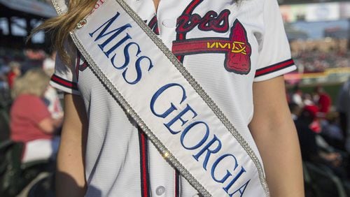 Miss Georgia 2018 Annie Jorgensen wears her sash before the start of a recent Braves game. ALYSSA POINTER / ALYSSA.POINTER@AJC.COM