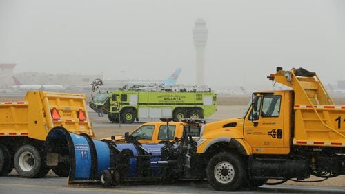 During the 2014 snowstorm, this was the scene from Hartsfield-Jackson International Airport Tuesday as the snow began to fall. JOHN SPINK / JSPINK@AJC.COM