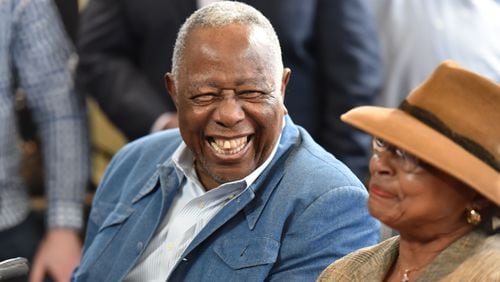 February 9, 2017 Atlanta - Hank Aaron, Braves Senior Vice President, shares a laugh with his Billye Aaron (right) during a press conference to make dedications at the new SunTrust Park to former vice president of player personnel Bill Lucas at SunTrust Park on Thursday, February 9, 2017. HYOSUB SHIN / HSHIN@AJC.COM