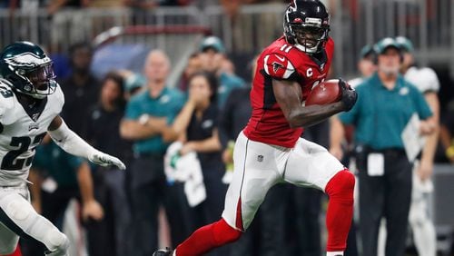 Falcons wide receiver Julio Jones (11) runs toward the end zone for a touchdown against Philadelphia Eagles free safety Rodney McLeod (23) during the second half of an NFL football game in Atlanta, in this Sunday, Sept. 15, 2019, file photo.  (AP Photo/John Bazemore, File)