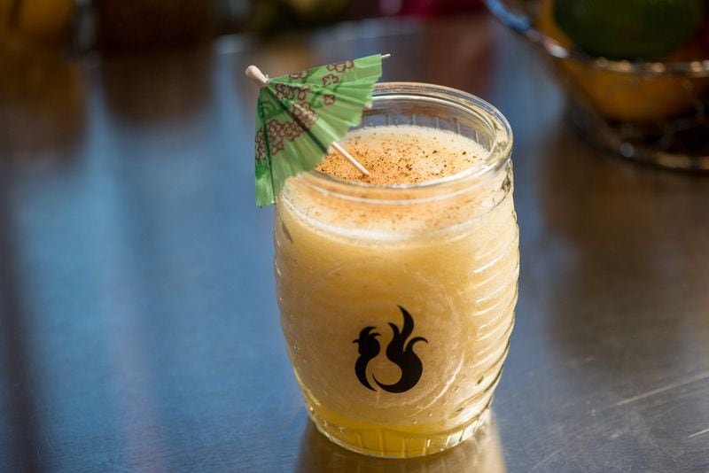  One Rooster Toasty Pineapple frozen cocktail with roasted pineapple, gold tequila, Amargo Chuncho bitters, brown sugar, and cinnamon. Photo credit - Mia Yakel.