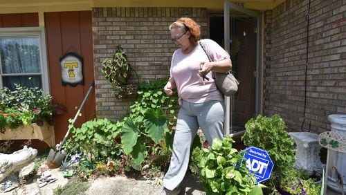 Jammie Duvall leaves her home in Columbus earlier this month. Duvall, a former cafeteria worker at West Central Georgia Hospital, said that after she reported that a warehouse worker was repeatedly making sexually explicit comments to her, a supervisor shrugged off the complaint. HYOSUB SHIN / HSHIN@AJC.COM