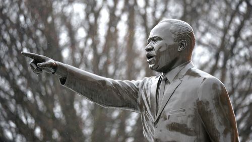 Statue of Martin Luther King Jr. can be seen in front of King’s Chapel on Morehouse College campus. HYOSUB SHIN / HSHIN@AJC.COM