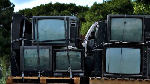 Hard-to-recycle items like old TVs will be accepted — for a fee — at Greenstock Day in Woodstock, April 25. AJC FILE