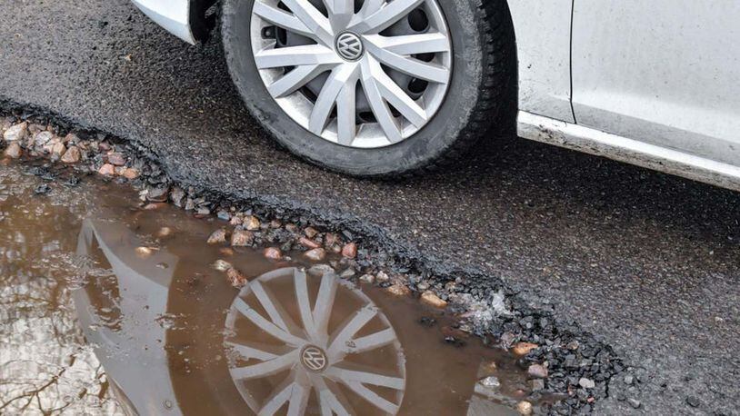 Pot holes and holes in roadways plague drivers in some cities, but when a driver in Detroit ended up in a giant hole caused by a water main break, it was because he ignored warning signs.