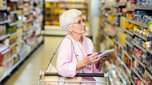 Many retailers, even grocery stores, offer discounts for seniors. DREAMSTIME
