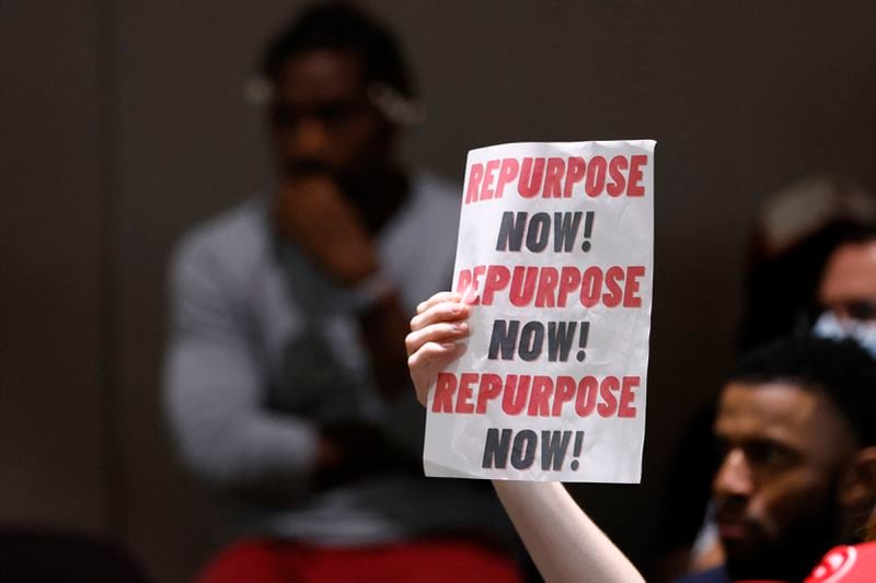 Activists protested during the Atlanta City Council meeting as officials discussed the lease of 700 jail beds to Fulton County. (Miguel Martinez / miguel.martinezjimenez@ajc.com)