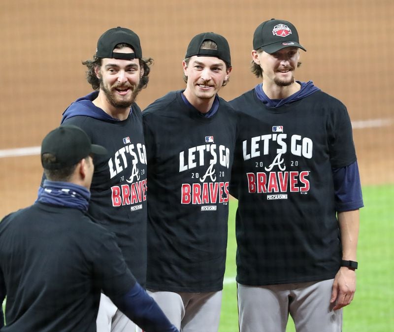 Braves starting pitchers (from left Ian Anderson, Max Fried and Kyle Wright celebrate advancing to the NL Championship Series by defeating the Marlins 7-0 in Game 3 of the National League Division Series on Thursday, Oct. 8, 2020 at Minute Maid Park in Houston, Texas.  (Curtis Compton/Atlanta Journal-Constitution)