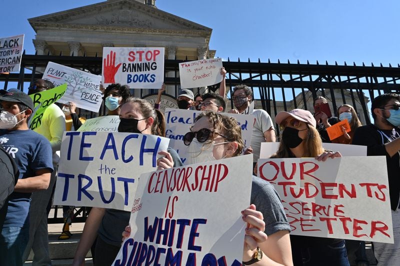 Teachers, parents and activists rallied outside the Georgia State Capitol on Feb. 12, 2022, to protest legislation by state Republican lawmakers that would limit how race can be discussed in classrooms. (Hyosub Shin / Hyosub.Shin@ajc.com)