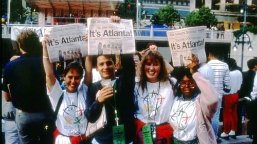 Atlantans cheer on Sept. 18, 1990, as their city is chosen for the 1996 Olympics. Courtesy of Atlanta History Center