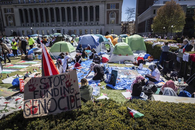 A sign sits erected at the Pro-Palestine protest encampment at the Columbia University campus in New York on Monday April 22, 2024. (AP Photo/Stefan Jeremiah) (AP Photo/Stefan Jeremiah)