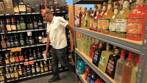 Lilburn package store owners can now own up to two licenses with the city. JASON GETZ / JGETZ@AJC.COM