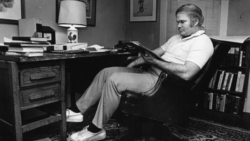 Author Pat Conroy in his garage office, 1984. AJC FILE