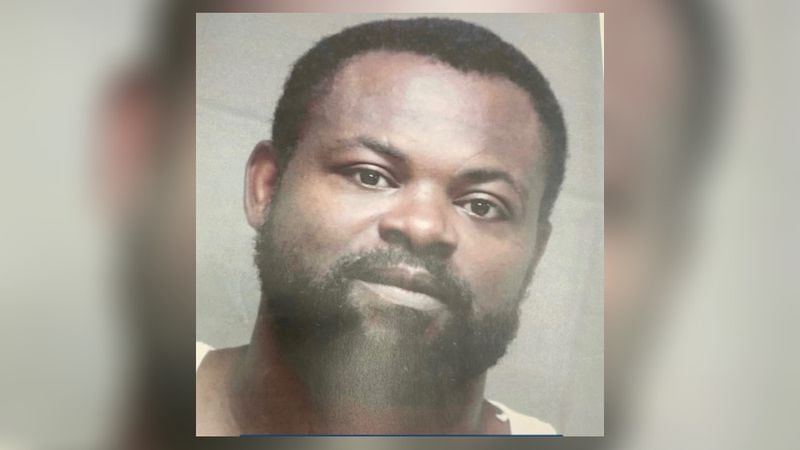 Damien "Luke" Ferguson, 43, is wanted in the deadly shooting of a Middle Georgia officer outside a police station.
