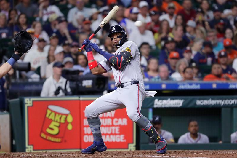 Atlanta Braves batter Ronald Acuna Jr. ducks to avoid getting hit by a pitch by Houston Astros' Spencer Arrighetti during the fourth inning of a baseball game Monday, April 15, 2024, in Houston. (AP Photo/Michael Wyke)
